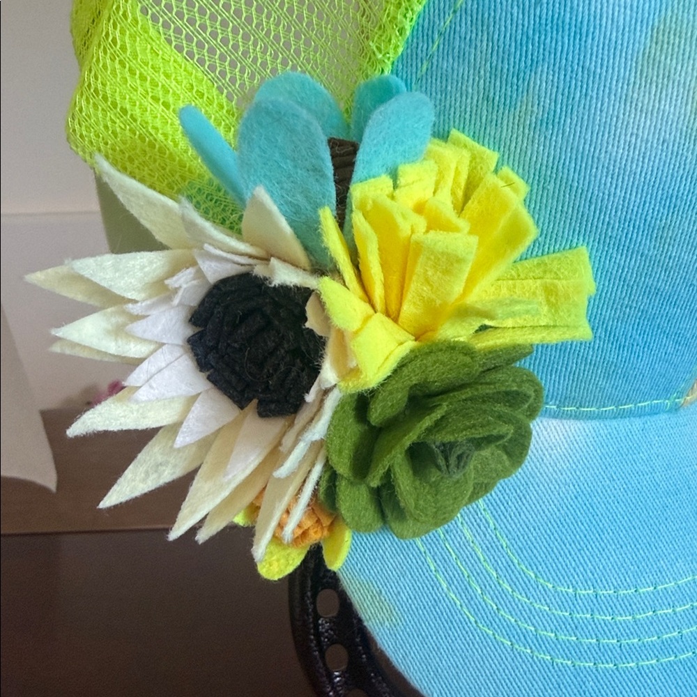 Turquoise Beige Neon Yellow Trucker Hat
With One of a kind Hand Crafted Flowers